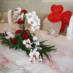 Inselhof Vineta Hochzeit rote Herzluftballon am Stuhl